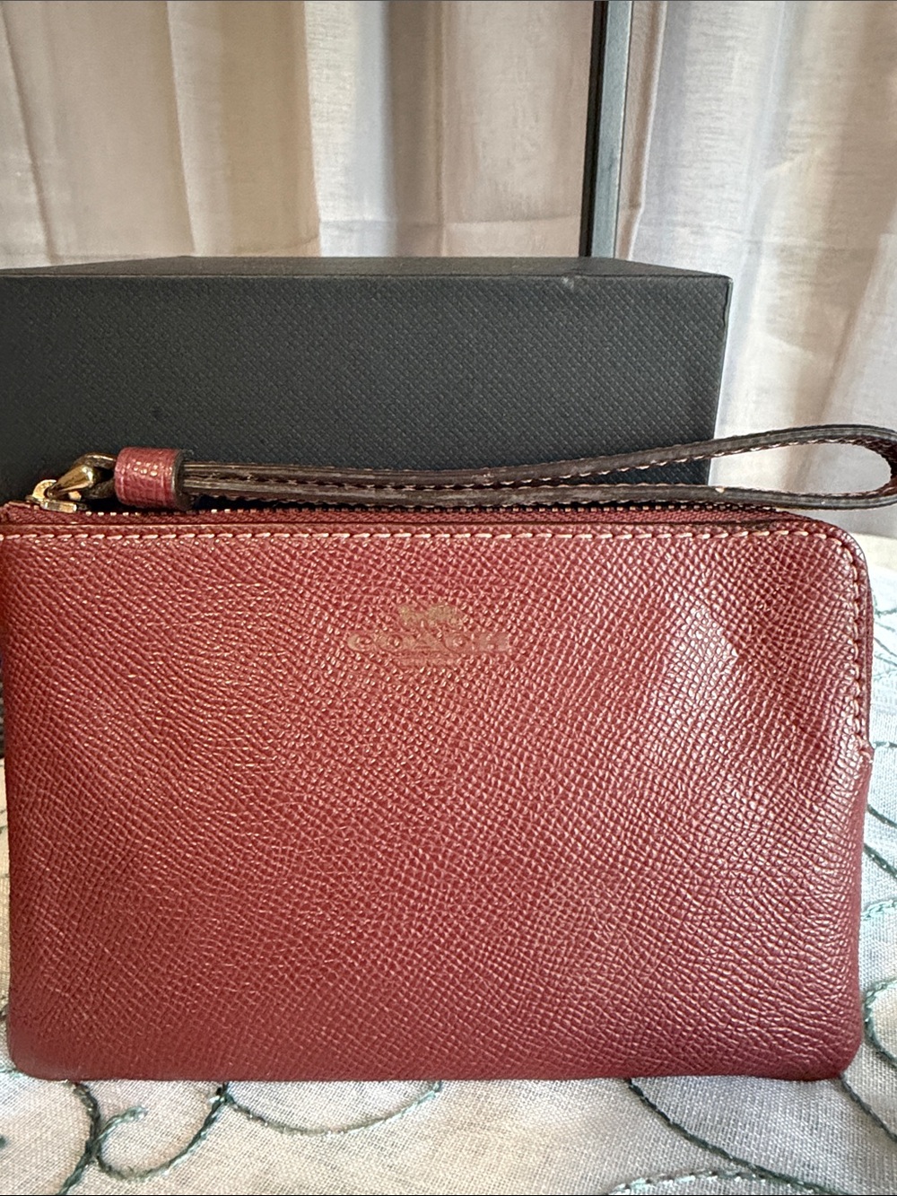 Coach Burgundy Pebbled Leather Wristlet with Brown Strap